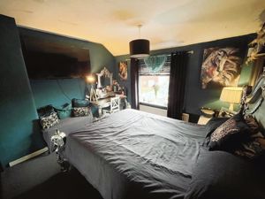 Bedroom One- click for photo gallery